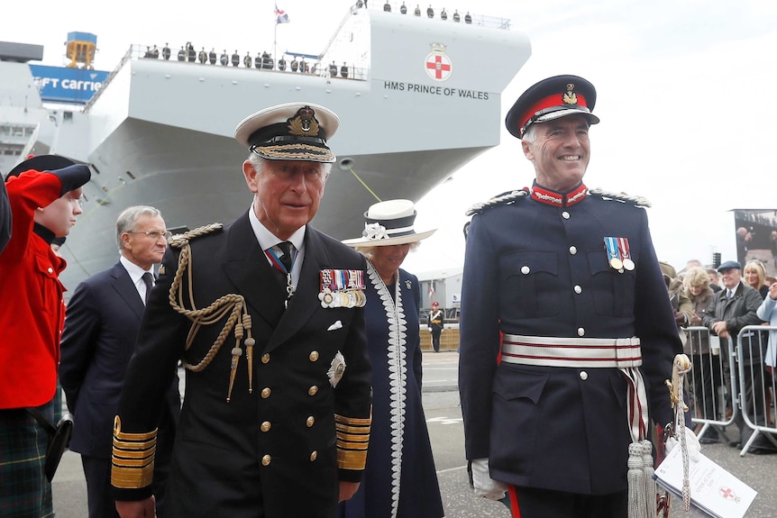 Prince Charles attends the naming ceremony for Royal Navy ship HMS Prince of Wales.