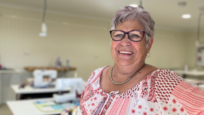 woman smiling in craft room