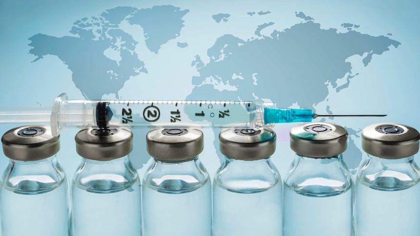 World map overlaid with glass vials and syringe