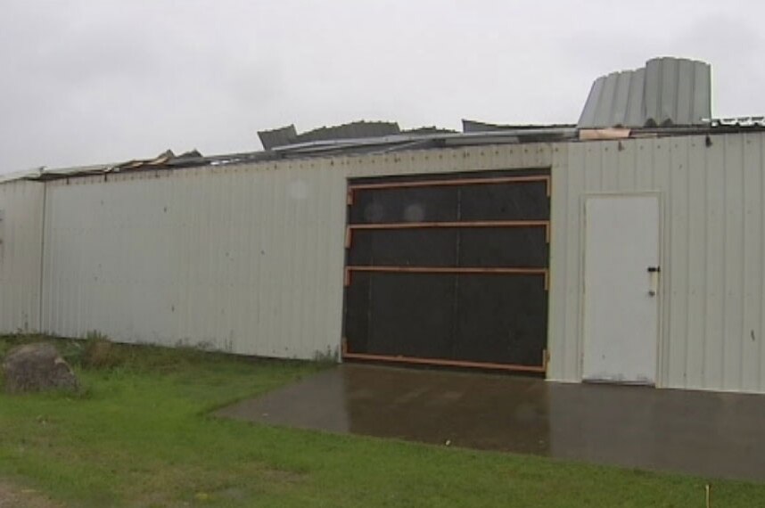 Damaged roof on building in Cooktown after Cyclone Nathan