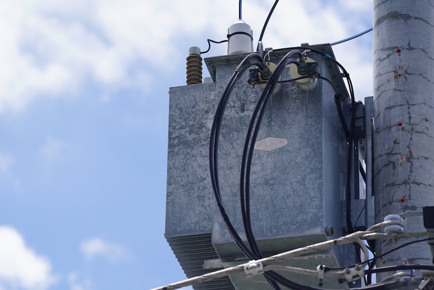 A power box on a pole. 