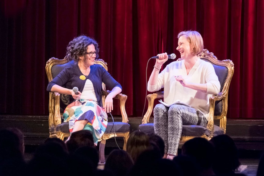 Annabel Crabb and Leigh Sales sitting in chairs