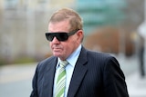 Former parliamentary speaker Peter Slipper arrives at the Magistrates Court in Canberra in July.