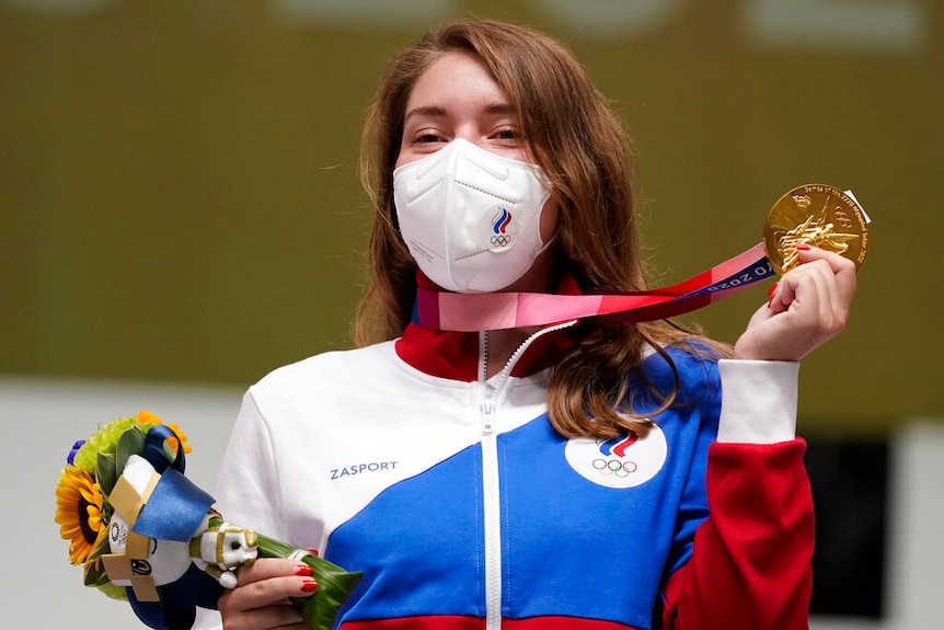 Vitalina Batsarashkin holds a gold medal.