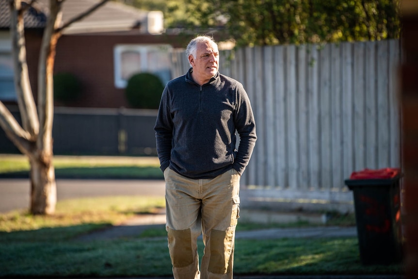 An older man walking.