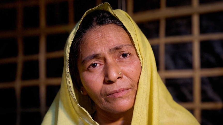 A closeup of Mustafa Khatun with a dejected look on her face.