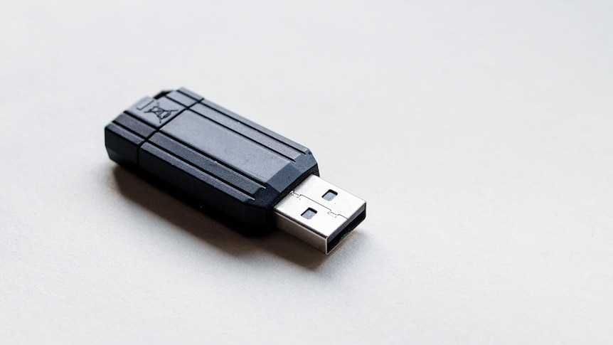 Close up of USB flash drive on white background.