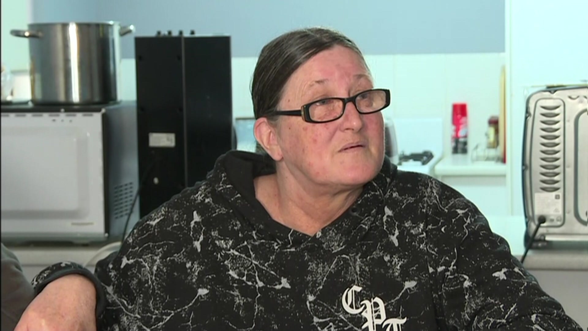 A close-up photo of a woman's face.