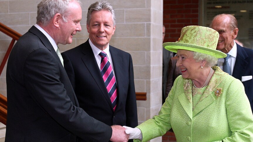 Queen shakes hands with McGuinness