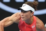 Samantha Stosur serves during the first round of the Australian Open