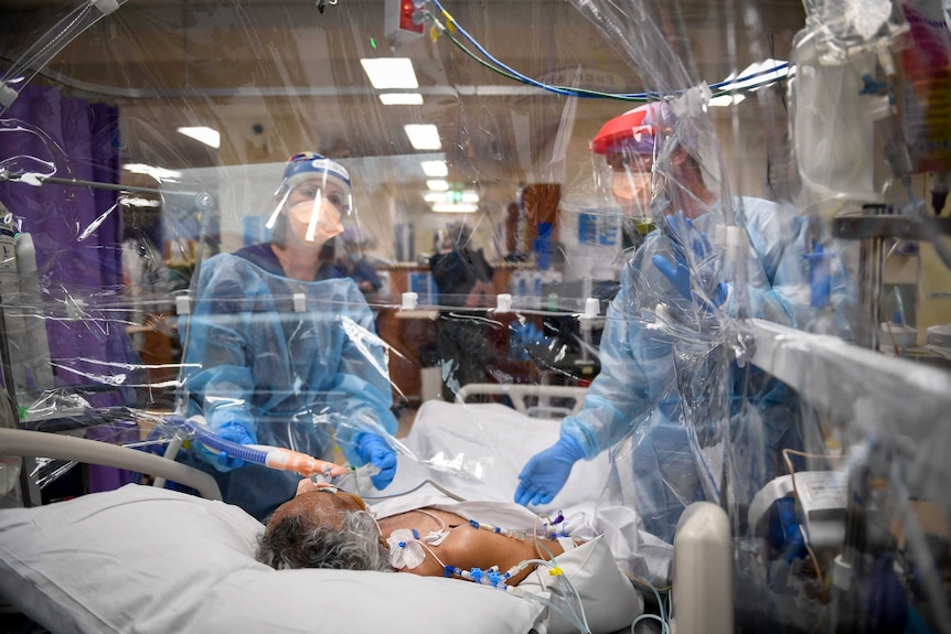 A patient in the intensive care unit at Footscray Hospital, used with permission from the patient's family
