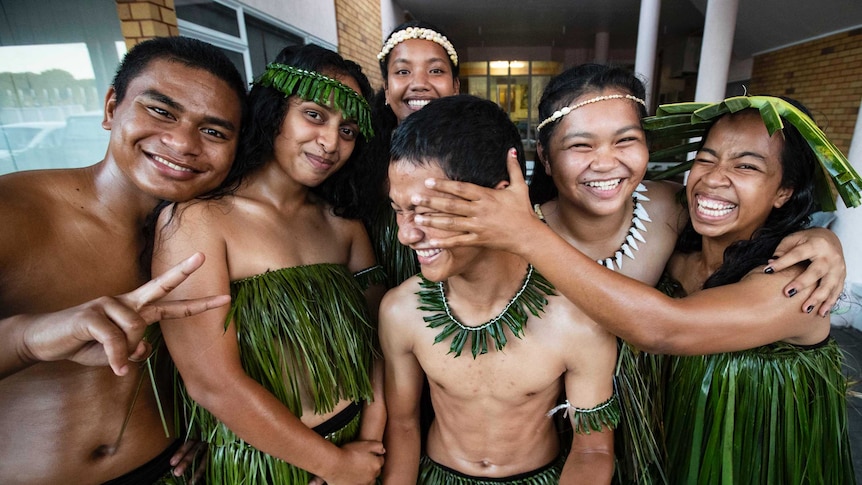 A Nauru cultural group at the Pacific Islands Forum, they are in traditional clothes made from grass.