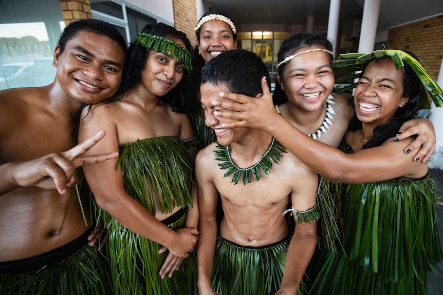 A Nauru cultural group at the Pacific Islands Forum, they are in traditional clothes made from grass.