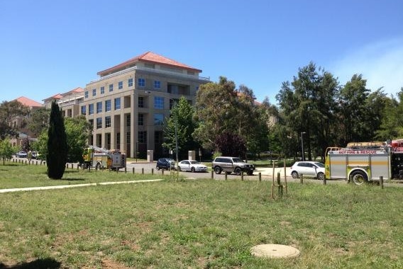 The DFAT building is evacuated as police investigate a suspicious package.