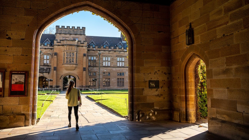 A university in Sydney, a woman is pictured walking through an archway