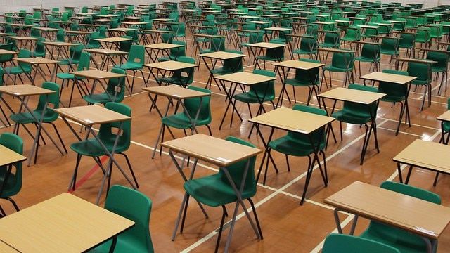 Desks lined up for an exam hall