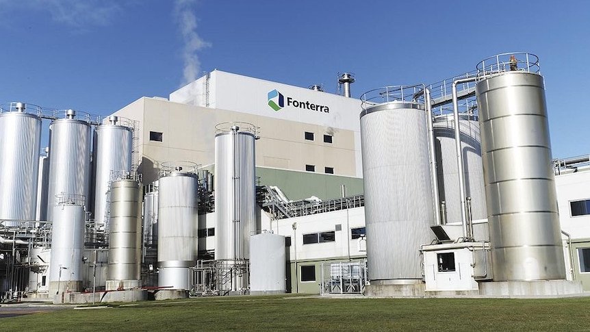 Large factory plant Fonterra milk processor with large steel tanks.