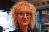 A portrait of Katrina Palmer in the ABC Radio Melbourne studios.