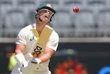 David Warner opens his mouth and throws his head back after being bowled