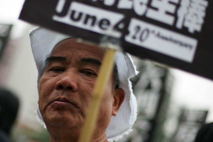 Demonstrators in Hong Kong mark the 20th Anniversary of the 1989 Tiananmen Square massacre in Beijing