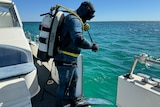 John Cecchi preparing for a dive off the Perth coast