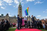 Justin Trudeau raises rainbow flag in parliament