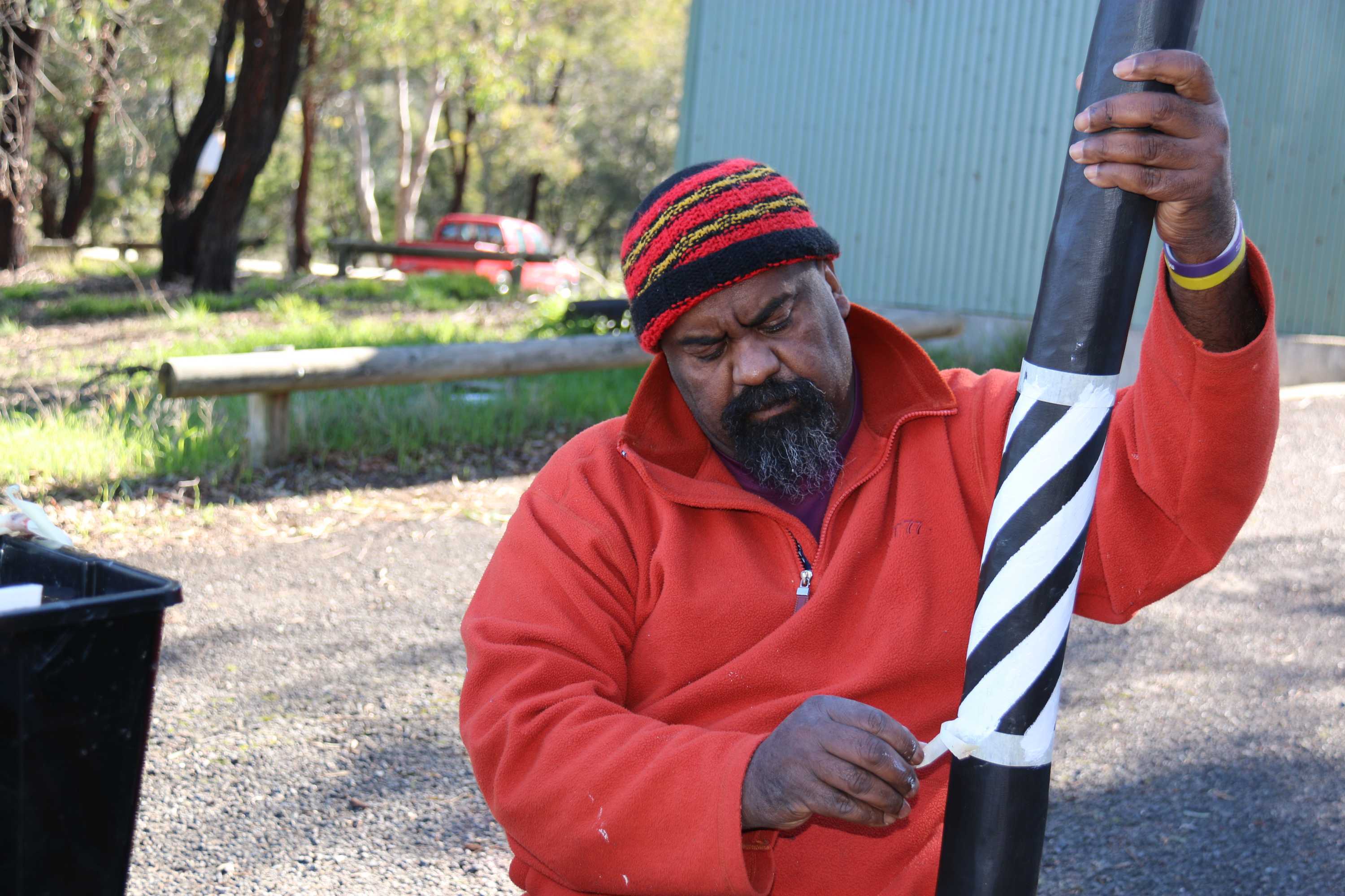 Canberra men rediscover cultural links through art of didgeridoo making