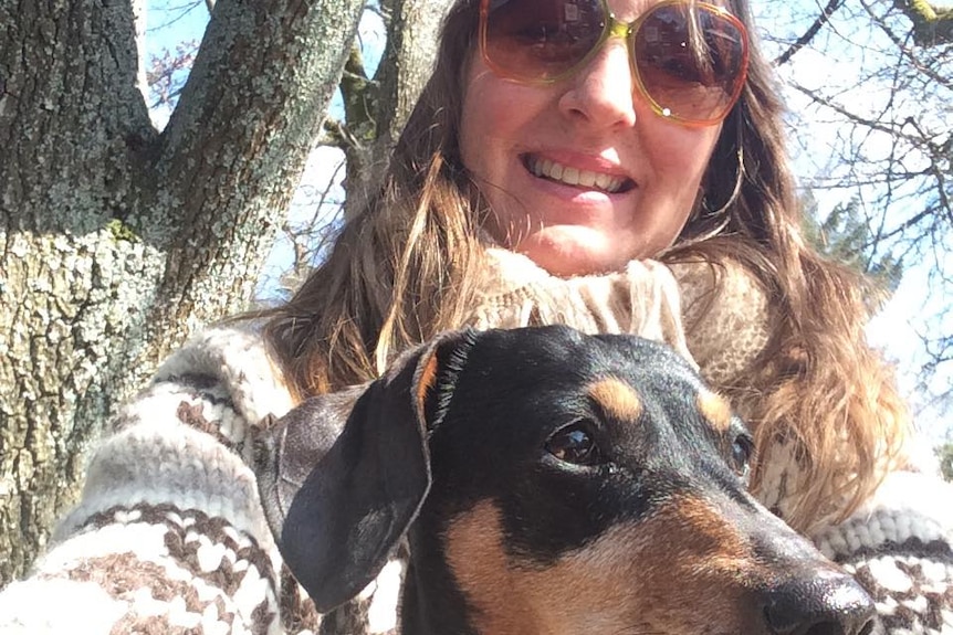 South Australian resident Trish Neis-Beer, pictured with a dog.