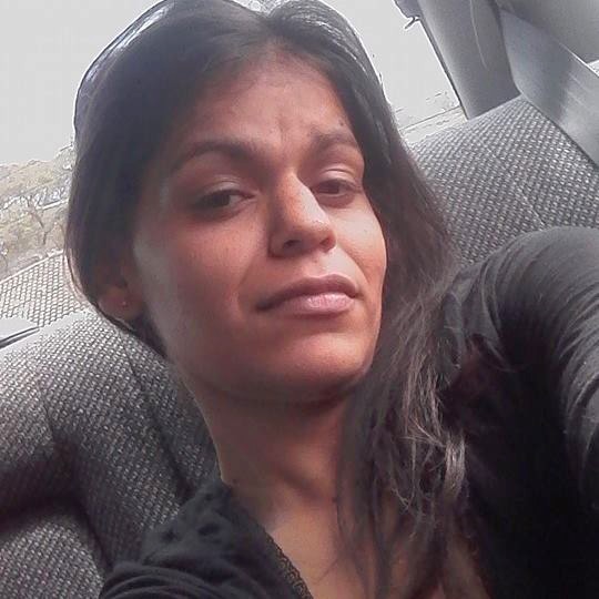 A selfie of Sinita Martin sitting in a car.