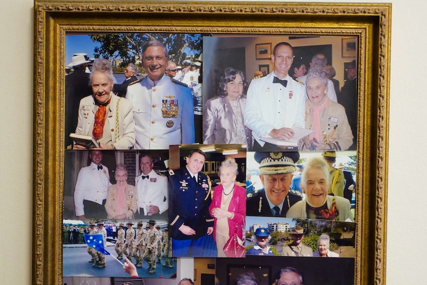A frame filled with photos of service people.