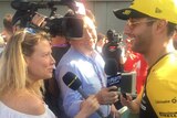 Daniel Ricciardo talks to BBC journalist Jennie Gow in the pitlane at the Australian F1 Grand Prix