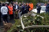 Kevin Rudd and Anna Bligh speak with a resident