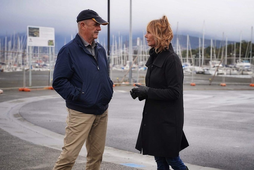Clarence Mayor Doug Chipman and resident Cheryl Davison near a construction site.
