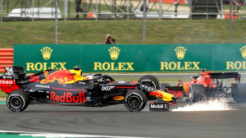 Max Verstappen's car goes spinning after colliding with Sebastian Vettel at Silverstone