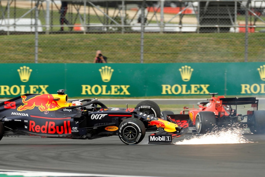 Max Verstappen's car goes spinning after colliding with Sebastian Vettel at Silverstone