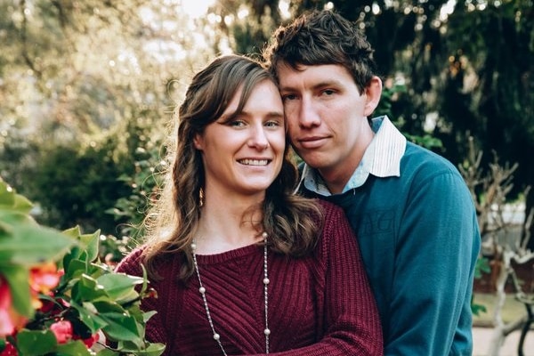 Samuel McPaul pictured hugging his wife, Megan.