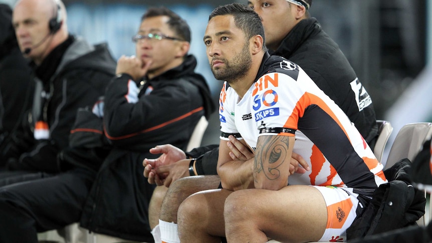 Benji Marshall sits on the bench for Wests Tigers against South Sydney.