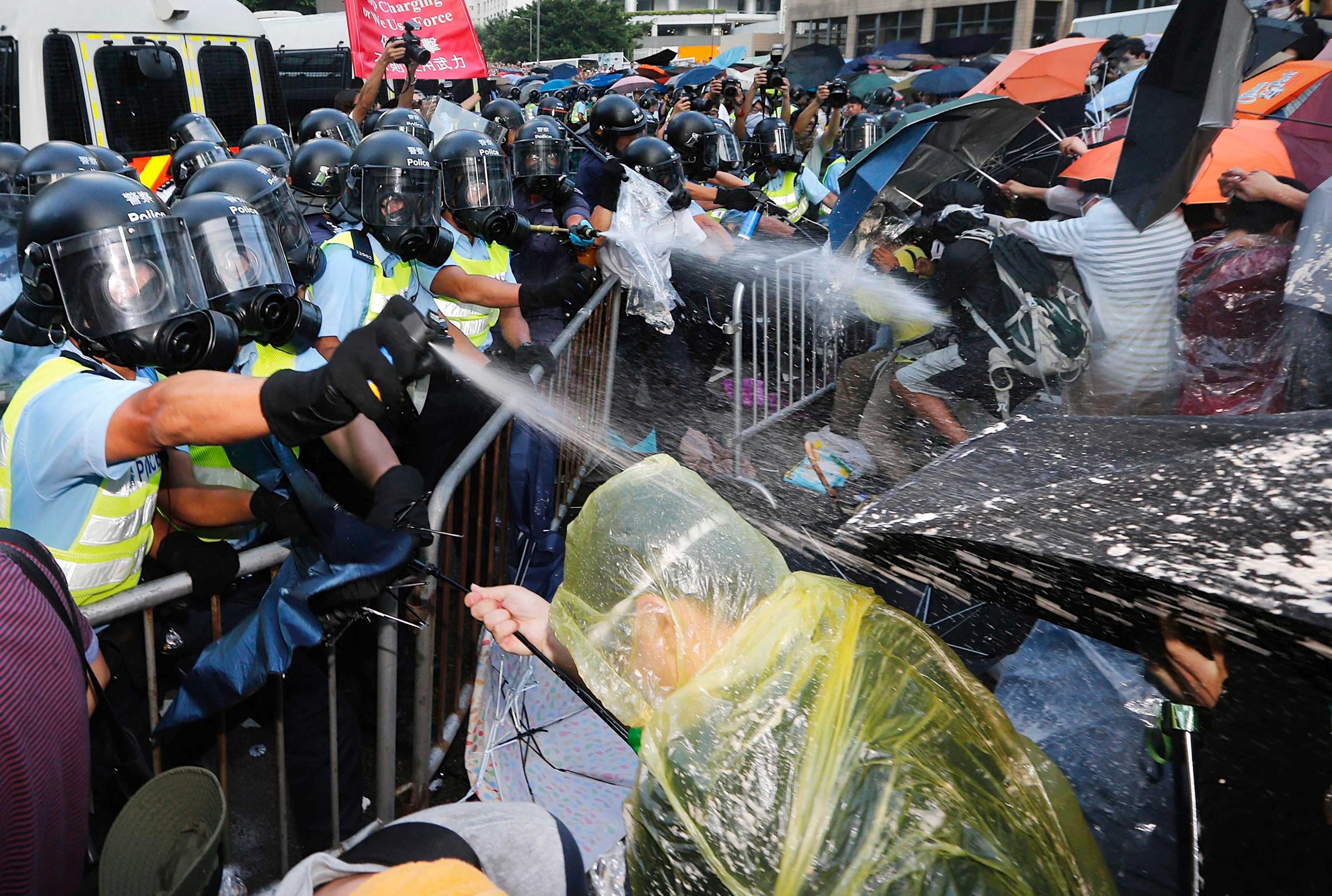 Hong Kong protests: Police fire tear gas, clash with pro-democracy demonstrators - ABC News