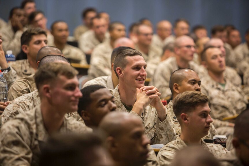 US Marines sit in a lecture hall