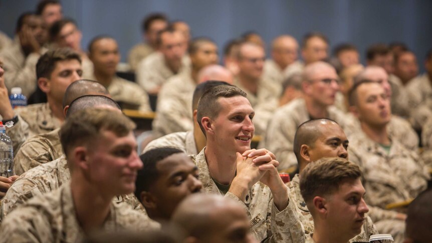 US Marines sit in a lecture hall