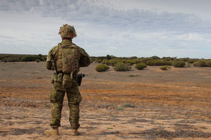 A soldier from 7RAR takes part in a live fire training scenario near Adelaide.