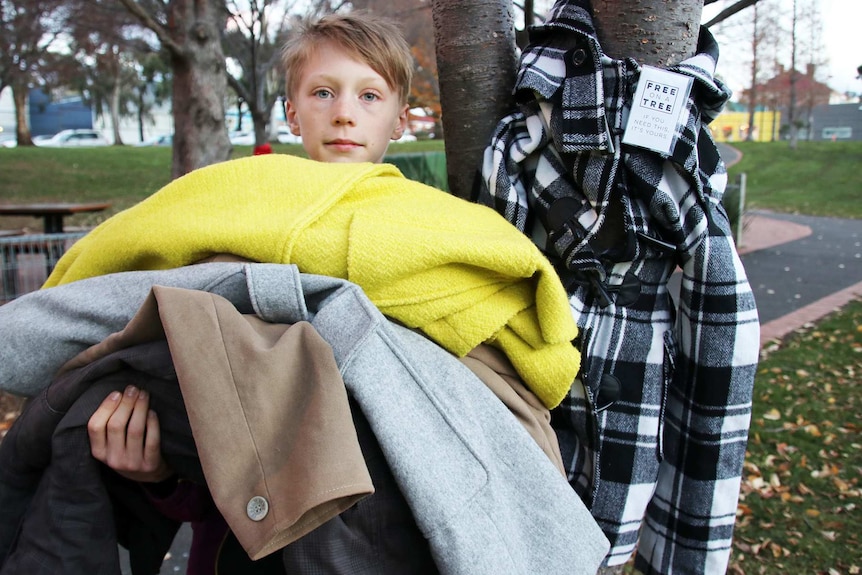 Free on a Tree's Oliver Edwards with an armful of garments.