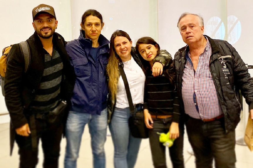 Angelo Romero (first left) with his family.