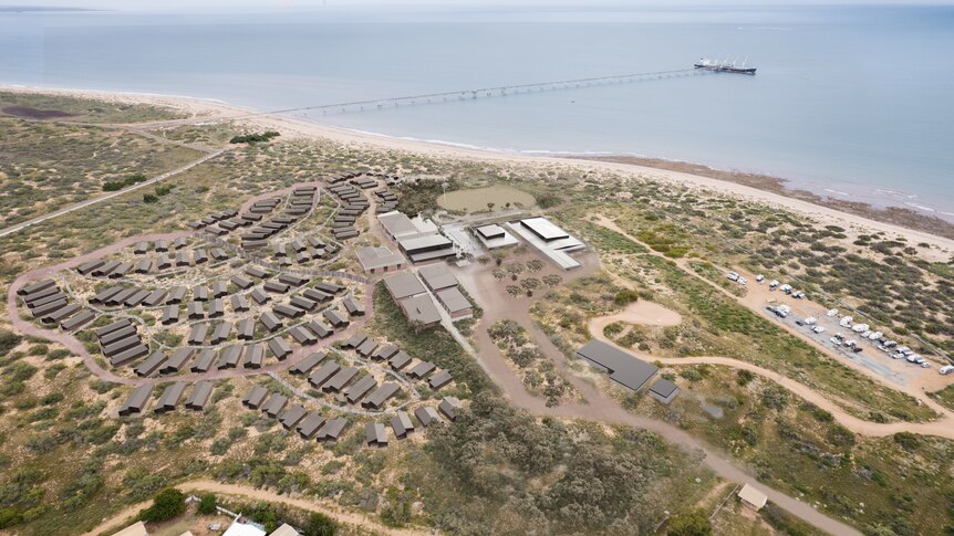 Aerial image showing units with sea and jetty in the background.