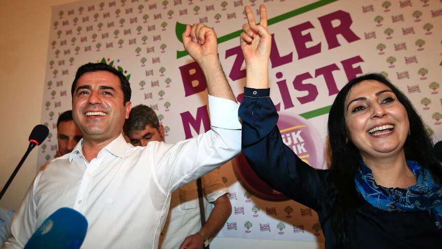 Selahattin Demirtas, left, co-chair of the pro-Kurdish Peoples' Democratic Party, (HDP) and Figen Yuksekdag, the other co-chair