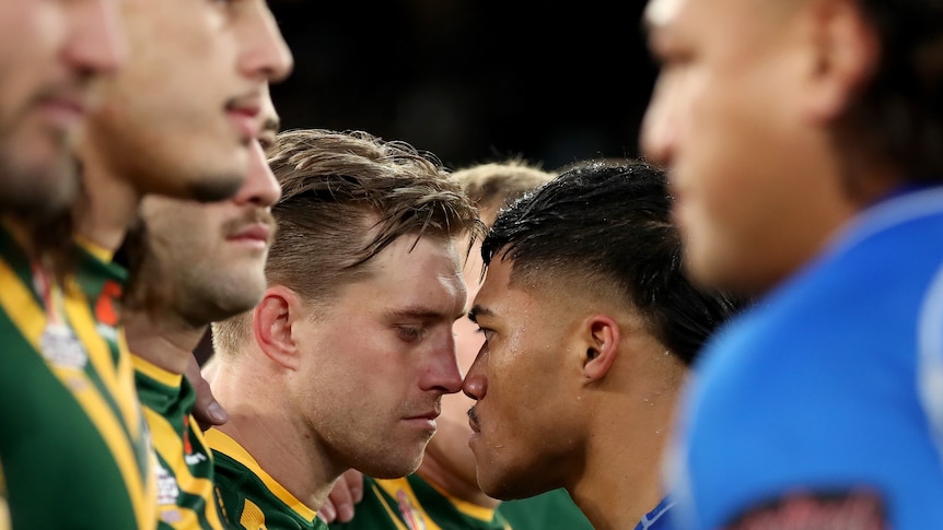 Cameron Munster and Brian To'o nose to nose after the siva tau before the Rugby League World Cup final.