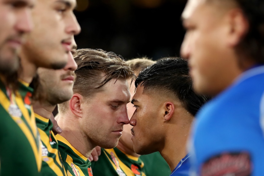 Cameron Munster and Brian To'o nose to nose after the siva tau before the Rugby League World Cup final.