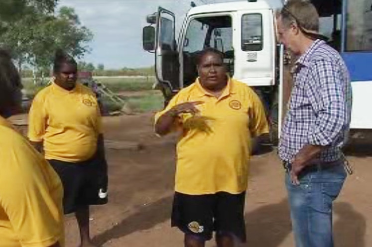 Federal Indigenous Affairs Minister Nigel Scullion talks with school attendance staff in Papunya, NT.