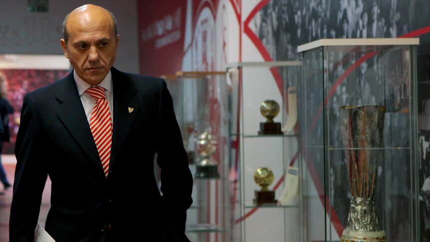 Sevilla president Jose Maria Del Nido leaves after announcing resignation from the club.