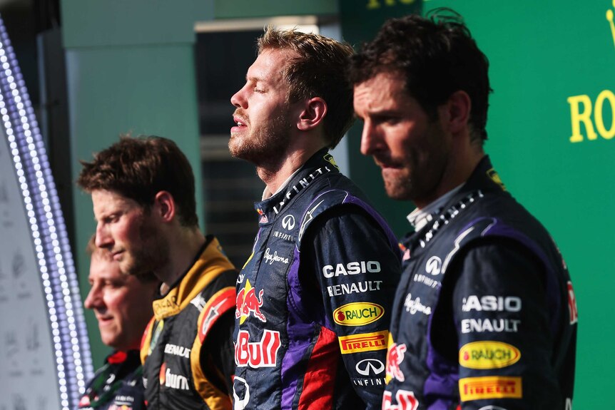 Vettel gathers his thoughts on the podium